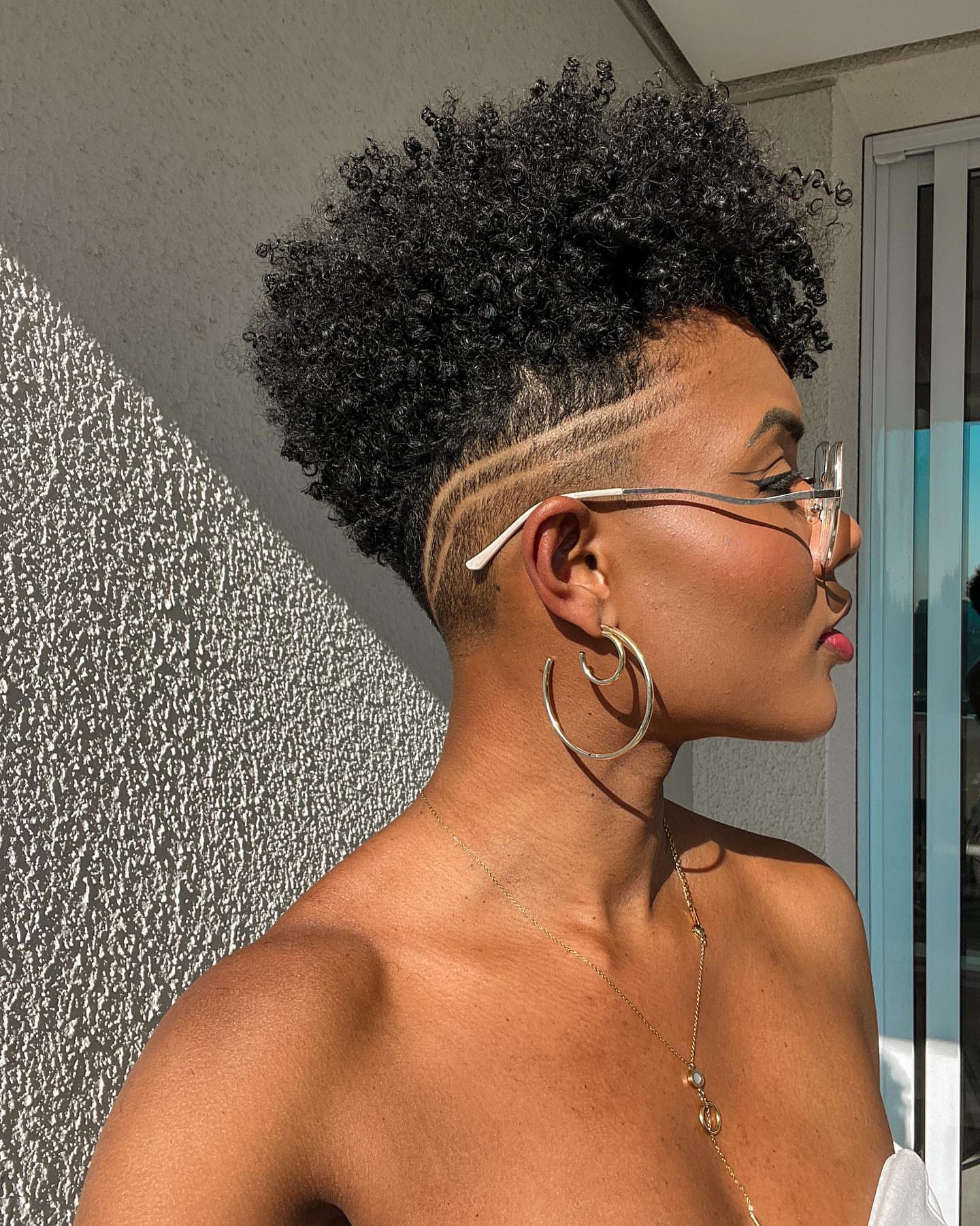 short black micro curly hairstyle undercut